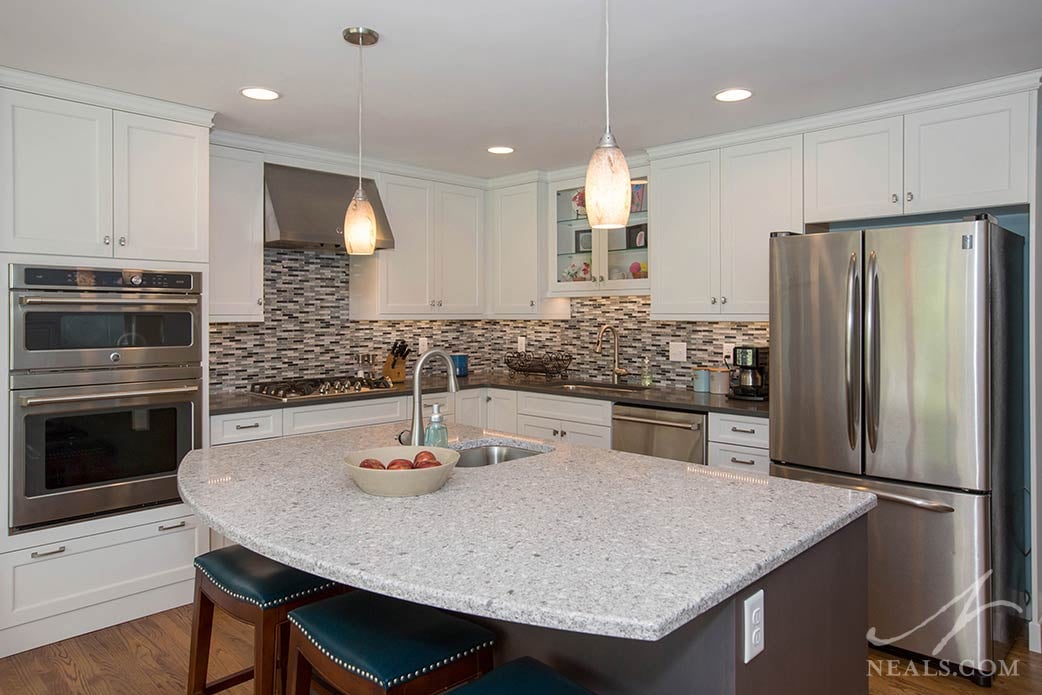 This kitchen in Montgomery uses semi-custom cabinetry in a unique arrangement that suits the homeowners storage needs.