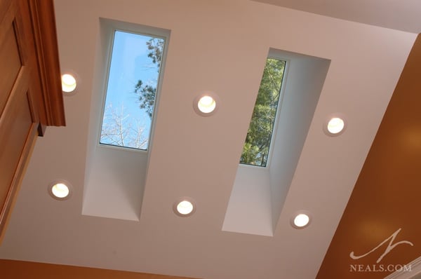 Two large skylights allow plenty of light to pour into this laundry room.
