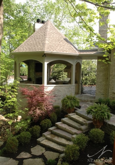 A Montgomery outdoor living project on a sloped yard.