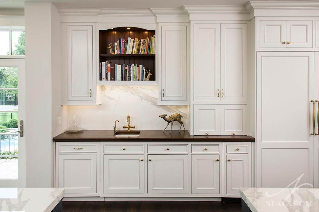 In this timeless Indian Hill kitchen, inset molding-applied cabinet doors add simple, unfussy detail.