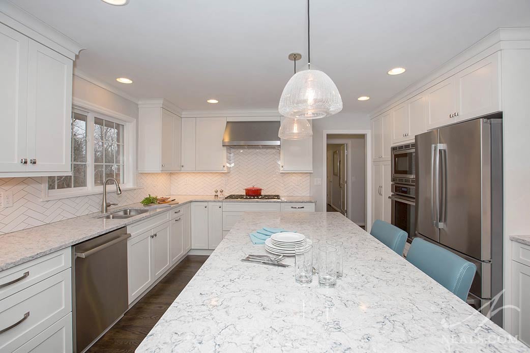 This transitional kitchen in Deer Park is complimented by a collection of stainless steel appliances.