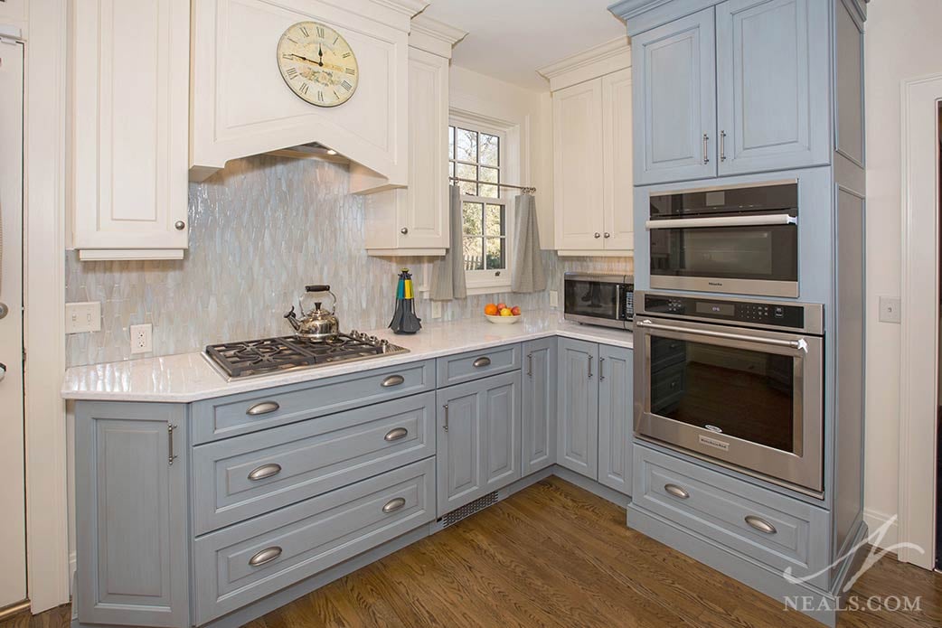 pale blue kitchen cabinets with vintage finish