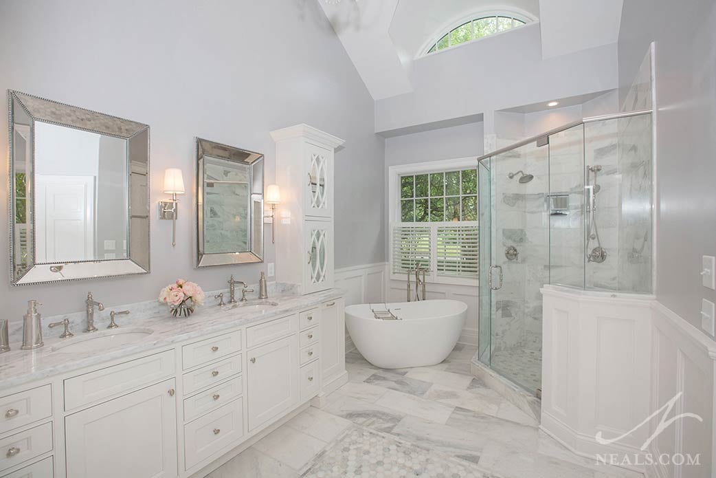 Marble features prominently in this Indian Hill master bathroom, including the First Snow marble vanity counter.