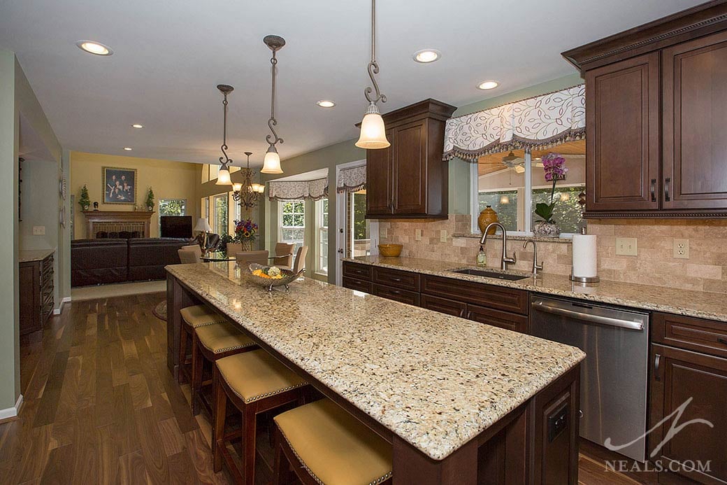 This Loveland kitchen features New Venetian Gold granite counters that brings the kitchen's entire color palette together.