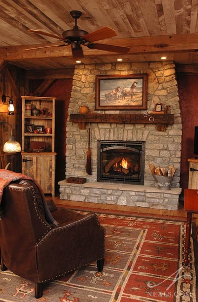 Rustic barn room fireplace after