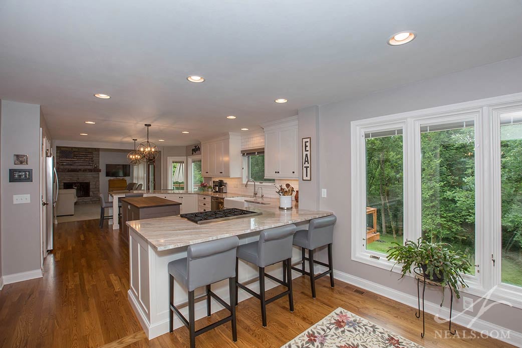 This West Chester kitchen uses peninsulas on both ends of the kitchen with different configurations of seating.