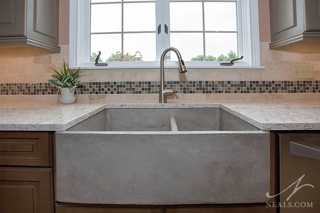 A concrete-look fireclay sink in this Maineville kitchen.