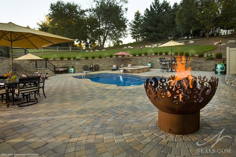 artisan fire ring in a Bridgetown backyard remodel