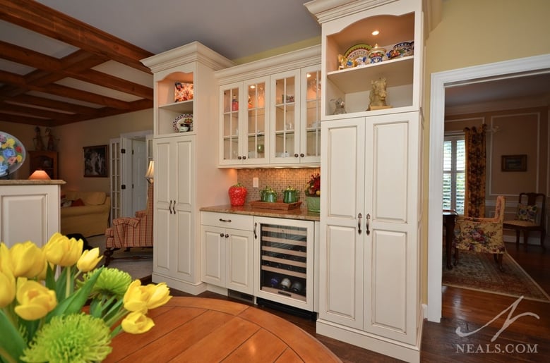 Situated between rooms, the beverage counter in this kitchen is a convenient spot for guests to top off.