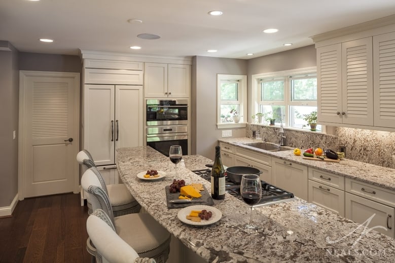 To gain space in this kitchen remodel, the exterior wall was pushed out 3 feet to provide wider corridors around the island.