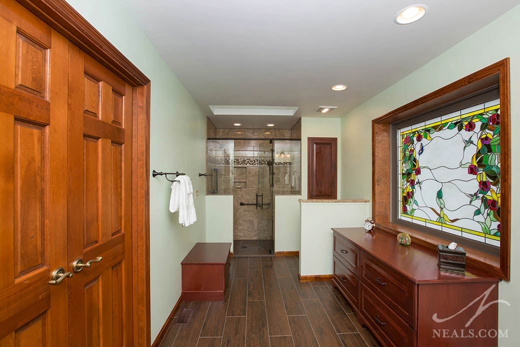 under-window base storage cabinet in the bathroom