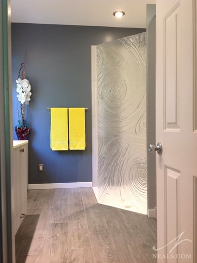 Artisan glass is used for a privacy wall and a style statement.