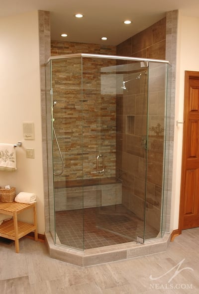 A walk in shower with doors