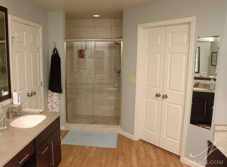 walk-in shower with sliding doors