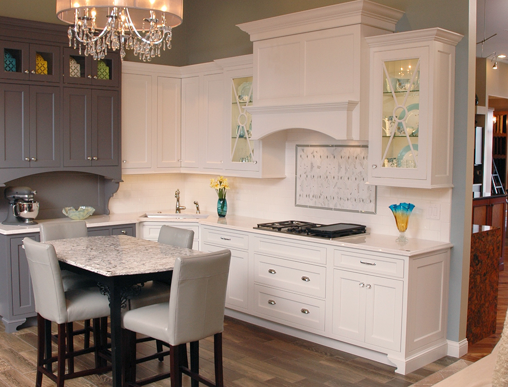 Our Cincinnati Design Showroom is full of inspiring examples like this white traditional kitchen.