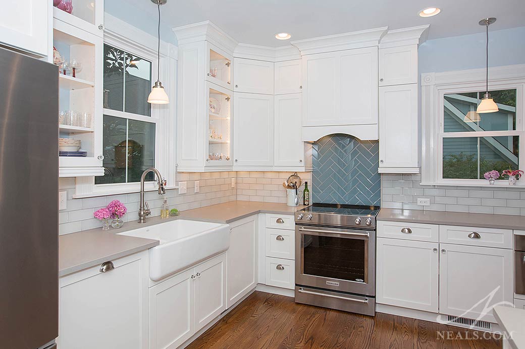 traditional kitchen with glass-fronted wall cabinets